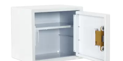 A white medicine cabinet with a heavy duty lock