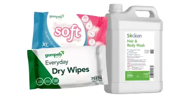 A selection of dry and wet wipes next to a container of body wash