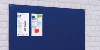 An outdoor noticeboard with a heavy duty screen protecting the contents
