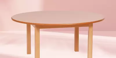 a large circular wooden table