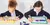 A boy and girl learning maths with cubes